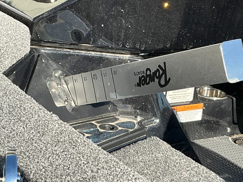Slide: The Image of Ranger Z520R 2024 boat measuring stick on gray carpet. - 47