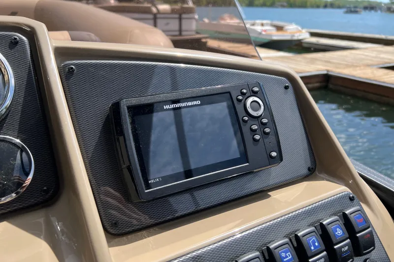 Slide: The Image of Dashboard of 2026 Starcraft EXS 3 R DH with Humminbird Helix 5 fishfinder. - 16