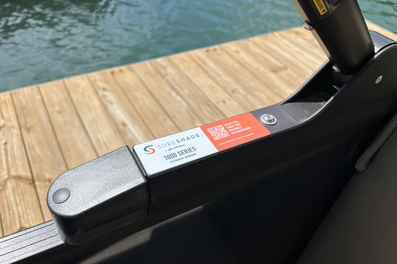 Slide: The Image of SureShade 1000 Series Power Bimini on 2026 Starcraft EXS 3 R DH boat. - 18