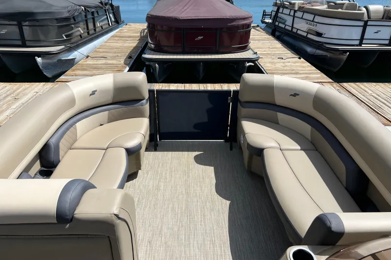 Slide: The Image of Luxurious seating on 2026 Starcraft EXS 3 R DH pontoon boat at dock. - 5