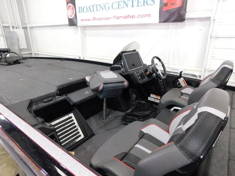 Slide: The Image of Interior of 2024 Ranger Z521R with modern seats and control console. - 12