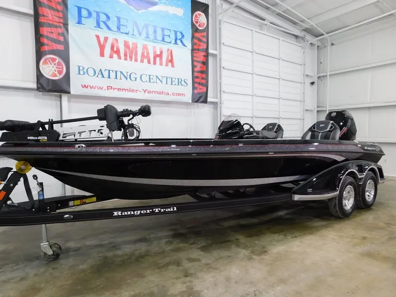 Slide: The Image of 2024 Ranger Z521R boat in a Yamaha workshop. - 3
