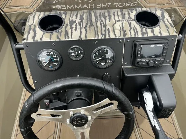 Slide: The Image of 2026 Thor LH1900CC boat dashboard with Mossy Oak design. - 25