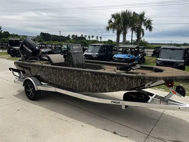 Slide: The Image of 2026 Thor LH1900CC boat with Baystar steering on trailer. - 29
