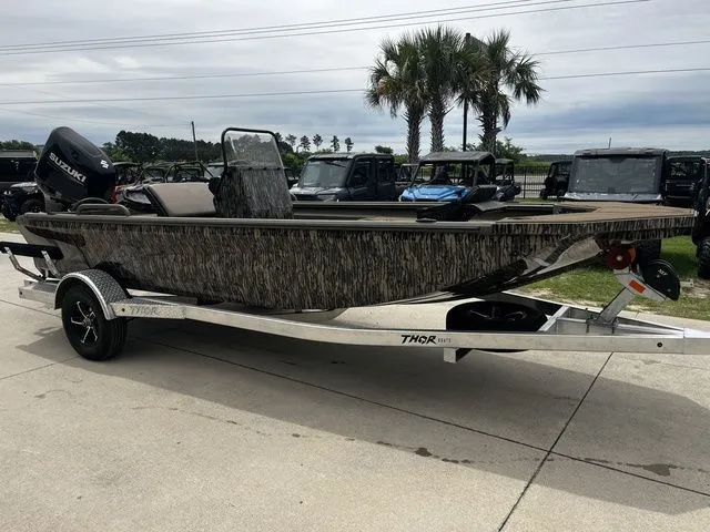 Slide: The Image of 2026 Thor LH1900CC boat with Baystar steering, Mossy Oak design. - 31