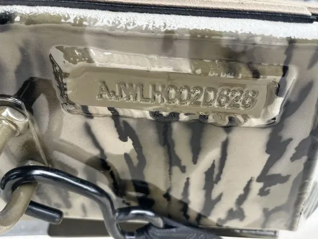Slide: The Image of Close-up of serial number on a 2026 Thor LH1900CC boat. - 6