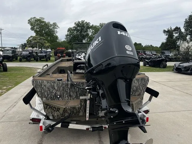 Slide: The Image of 2026 Thor LH1900CC boat with Suzuki 140 engine, Mossy Oak design. - 8