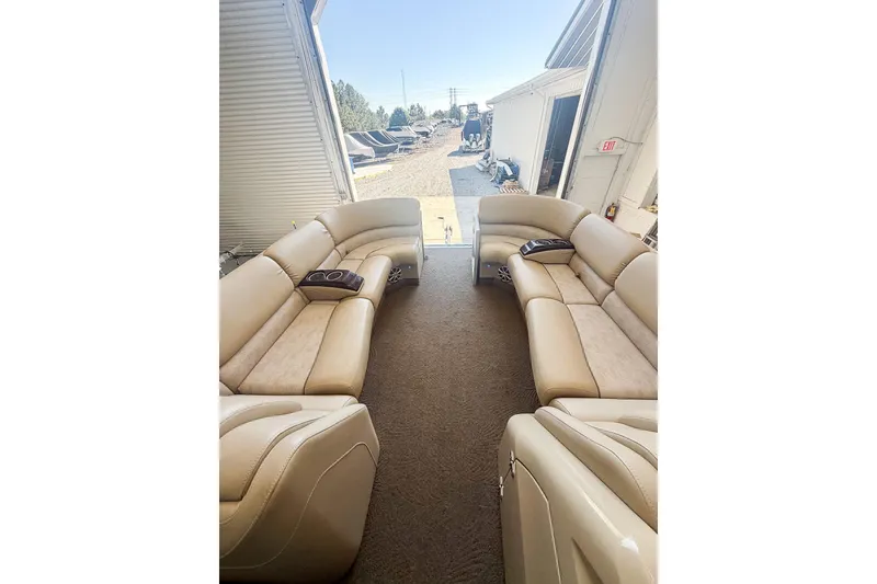 Slide: The Image of Luxurious interior of 2011 Bennington 2275RLi pontoon boat with beige seating. - 13