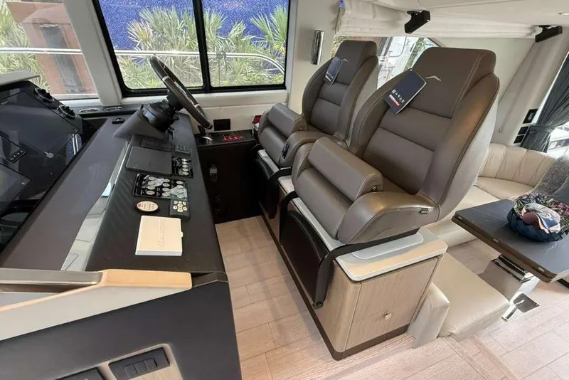Slide: The Image of Luxurious interior of 2022 Azimut Fly 50 yacht with modern helm and seating. - 12