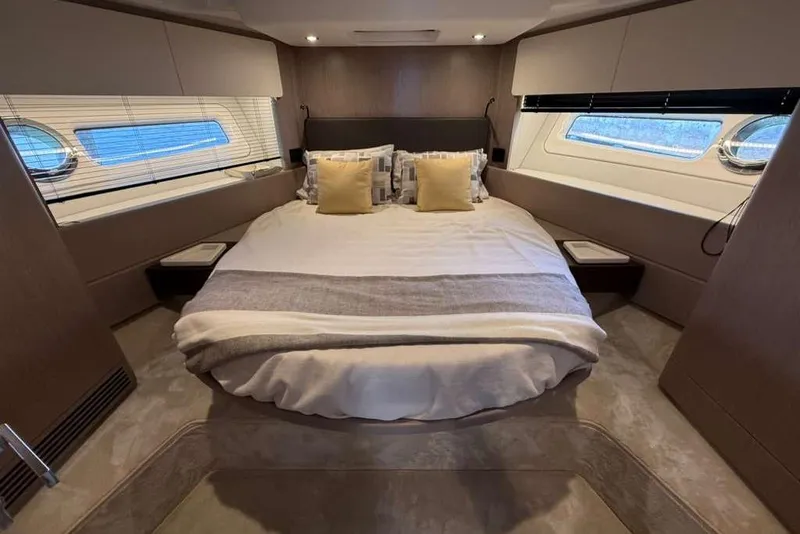 Slide: The Image of Luxurious bedroom interior of 2022 Azimut Fly 50 yacht with elegant bedding and modern design. - 19