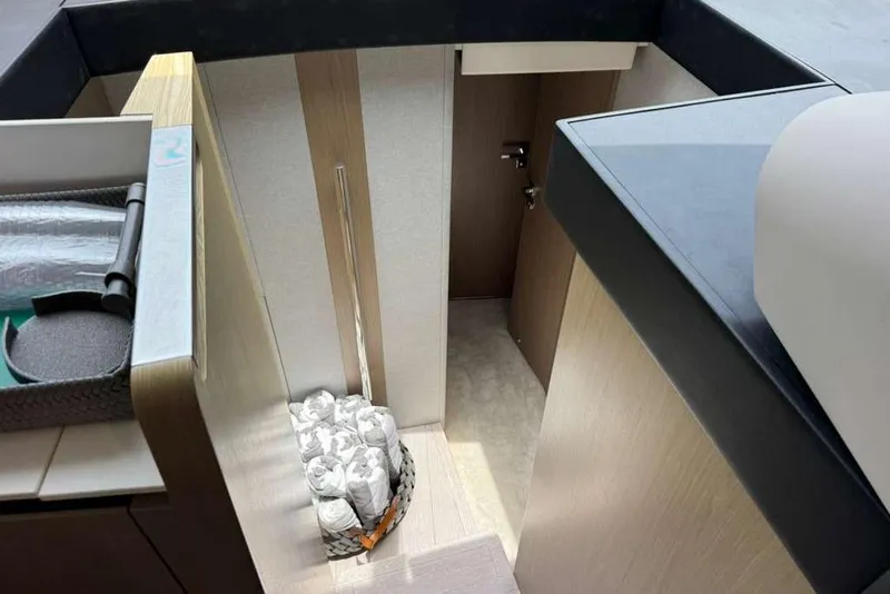 Slide: The Image of Interior view of 2022 Azimut Fly 50 yacht, featuring modern design and storage space. - 22