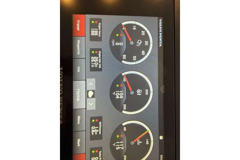 Slide: The Image of Dashboard display of a 2022 Azimut Fly 50 yacht, showing engine metrics and controls. - 28