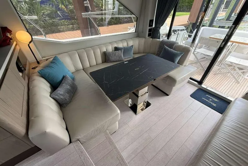 Slide: The Image of Luxurious interior of 2022 Azimut Fly 50 yacht with elegant seating and modern decor. - 6