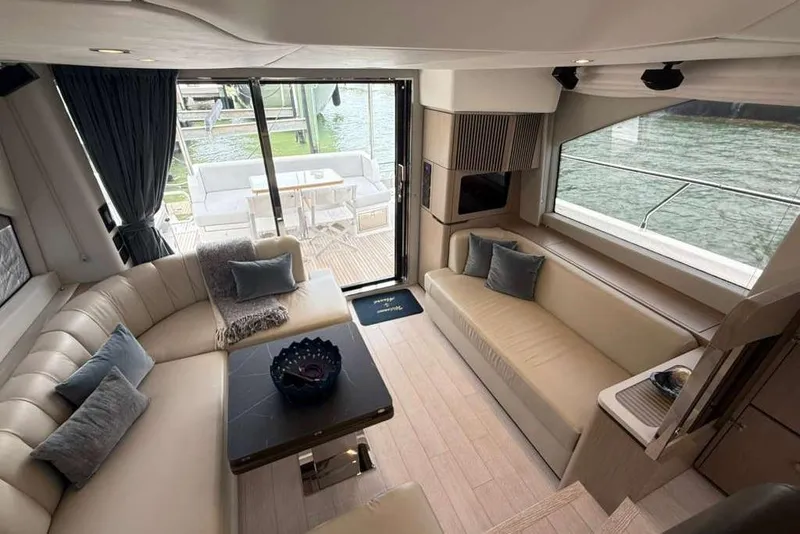Slide: The Image of Luxurious interior of 2022 Azimut Fly 50 yacht with elegant seating and waterfront view. - 7