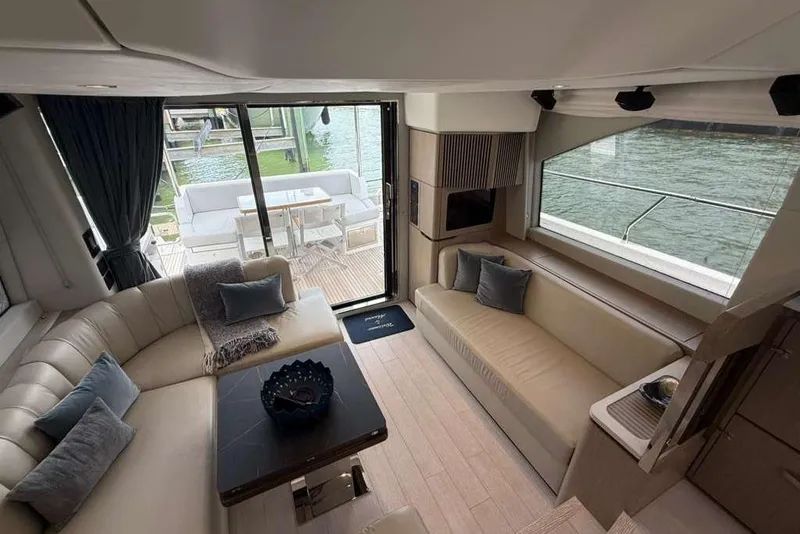 Slide: The Image of Luxurious interior of 2022 Azimut Fly 50 yacht with elegant seating and waterfront view. - 8