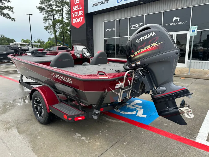 Slide: The Image of 2025 Vexus AVX1880 boat with Yamaha Vmax engine in parking lot. - 10