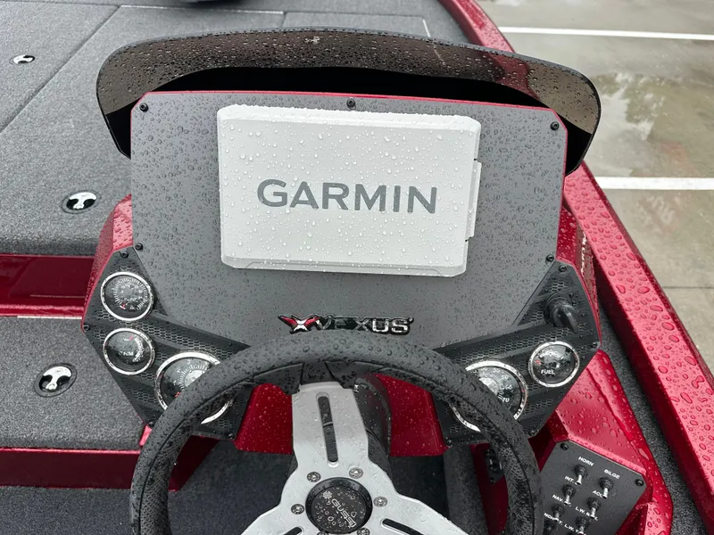 Slide: The Image of 2025 Vexus AVX1880 boat with Garmin navigation system in rain. - 12