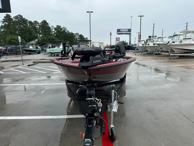 Slide: The Image of Vexus AVX1880 2025 boat displayed on wet parking lot. - 5