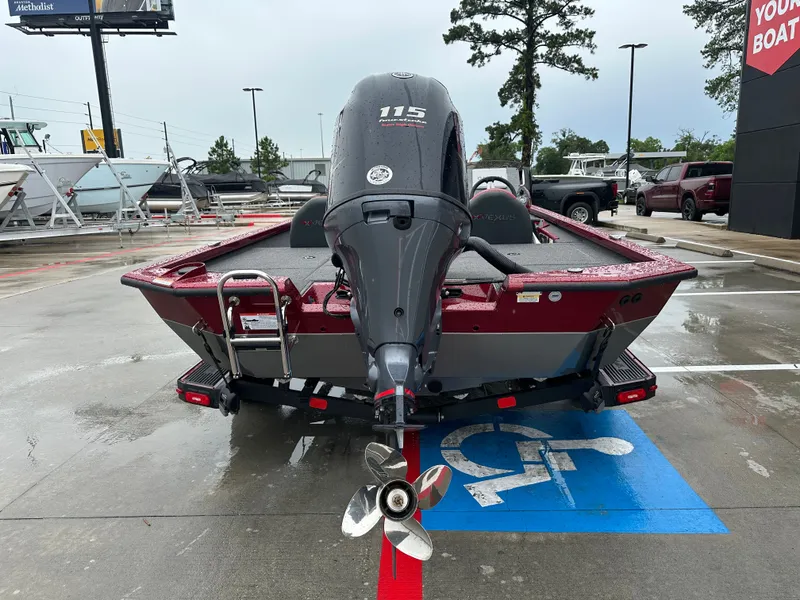 Slide: The Image of Rear view of a 2025 Vexus AVX1880 boat in a parking lot. - 9