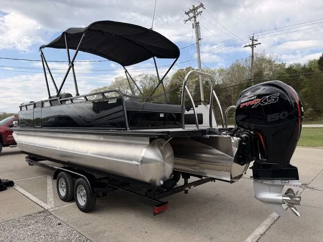 Slide: The Image of 2026 Avalon Venture 85 pontoon boat with outboard motor on trailer. - 12