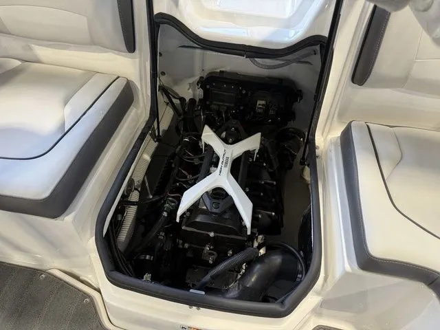 Slide: The Image of Engine compartment of 2026 Yamaha Boats SX190 with open access. - 10