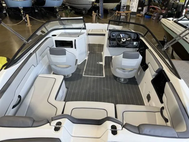 Slide: The Image of Interior of a 2026 Yamaha Boats SX190 with gray seating. - 6