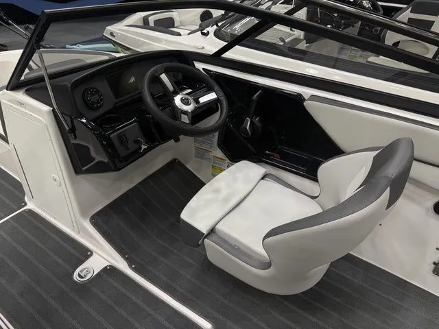 Slide: The Image of Interior of 2026 Yamaha Boats AR190 with steering console and seat. - 11