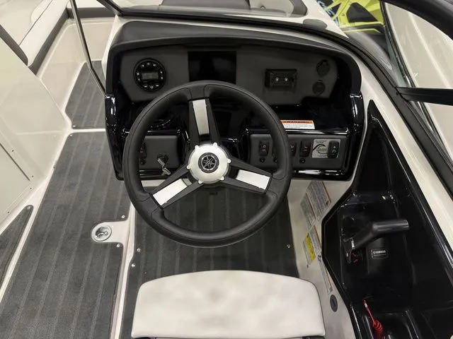 Slide: The Image of Interior view of 2026 Yamaha Boats AR190 cockpit. - 13