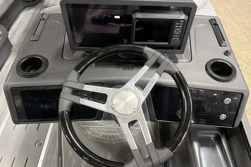 Slide: The Image of Steering console of 2026 Bennington 22 M Open Fastback Quad Bench with modern controls. - 12