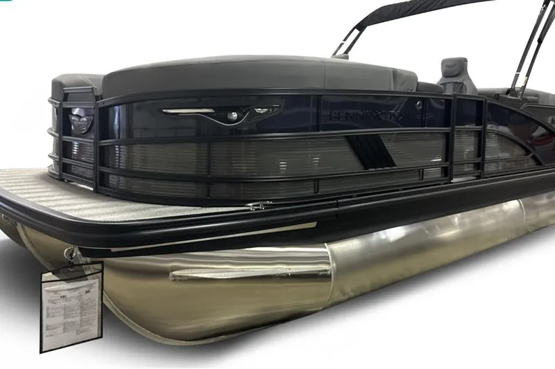 Slide: The Image of 2026 Bennington 22 M Open Fastback Quad Bench pontoon boat, sleek design, side view. - 4