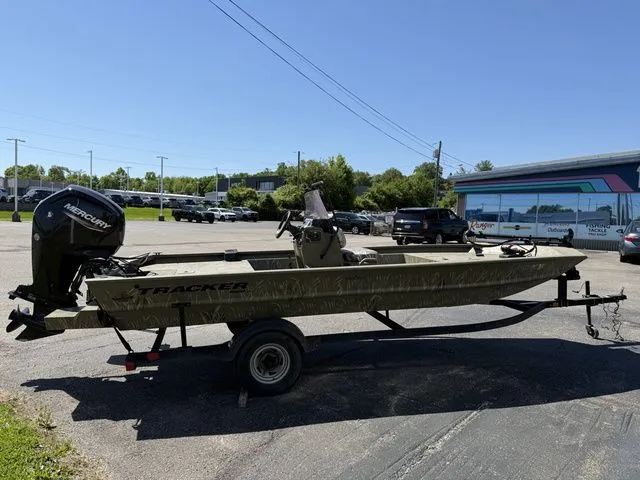 Slide: The Image of 2022 Tracker 1860CC Jon MXW Grizzly boat on trailer. - 6