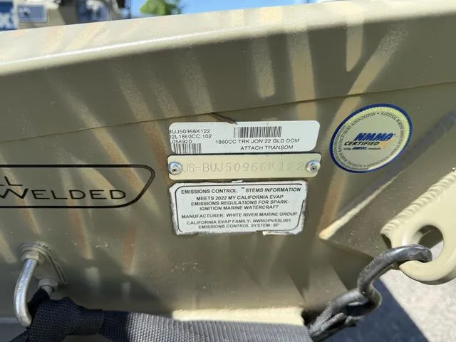 Slide: The Image of Tracker 1860CC Jon MXW Grizzly 2022 boat plate with emissions information. - 8