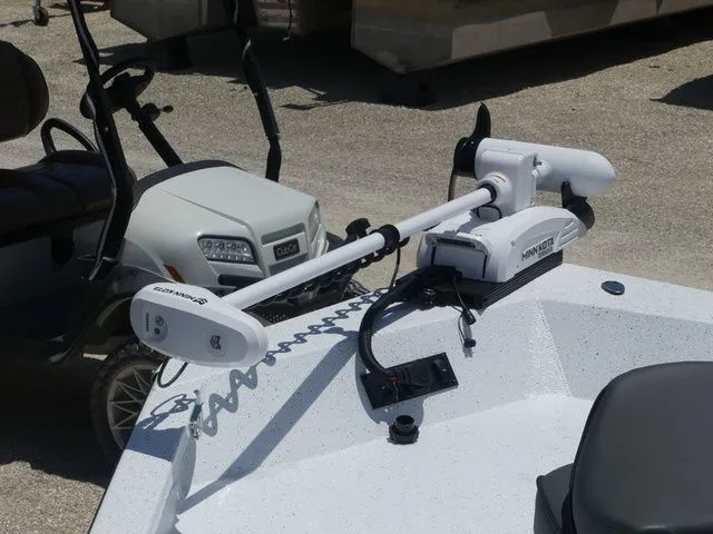 Slide: The Image of Minn Kota trolling motor on Xpress Boats SW22B, 2026 model. - 11