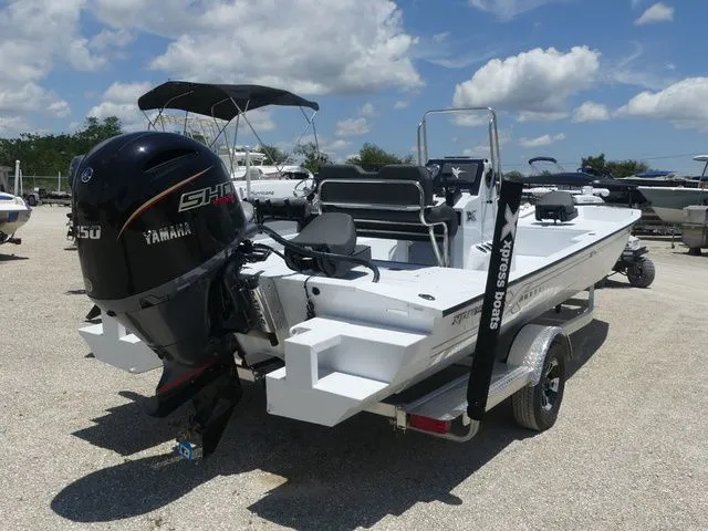 Slide: The Image of 2026 Xpress Boats SW22B with Yamaha engine on trailer. - 4