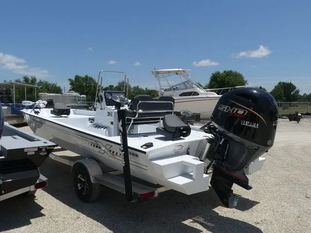 Slide: The Image of 2026 Xpress Boats SW22B with Yamaha motor on trailer. - 6
