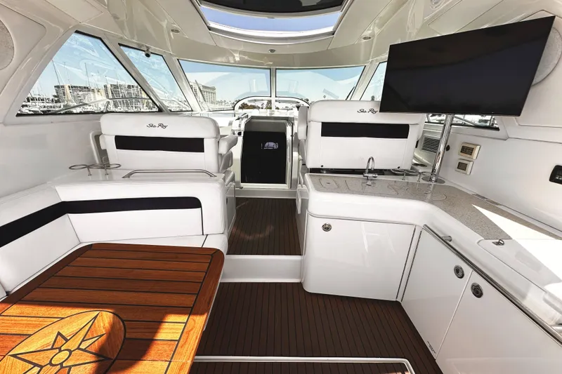 Slide: The Image of Luxurious interior of 2010 Sea Ray 450 Sundancer yacht with modern amenities and sleek design. - 15