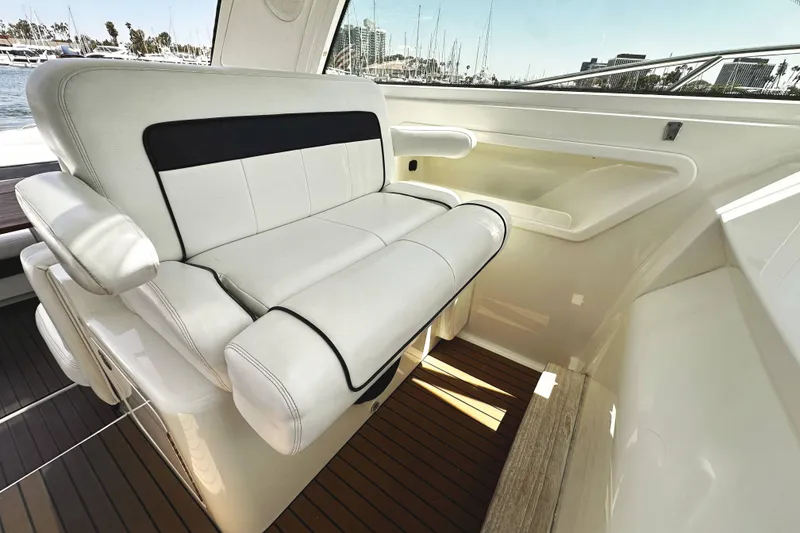 Slide: The Image of Luxurious seating on 2010 Sea Ray 450 Sundancer yacht with elegant interior design. - 25