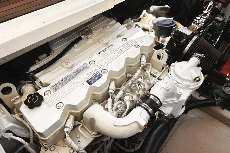 Slide: The Image of Engine compartment of a 2010 Sea Ray 450 Sundancer with Cummins diesel engine. - 51