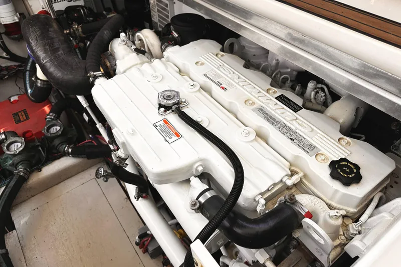 Slide: The Image of Engine compartment of a 2010 Sea Ray 450 Sundancer, featuring a Cummins engine. - 52