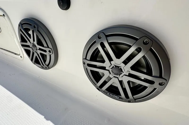 Slide: The Image of Speakers on a 2021 Robalo 246 Cayman boat, featuring JL Audio marine sound system. - 19