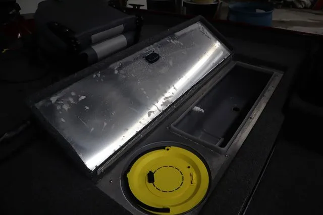 Slide: The Image of Lowe Skorpion 17 2022 boat hatch with storage and yellow lid. - 10