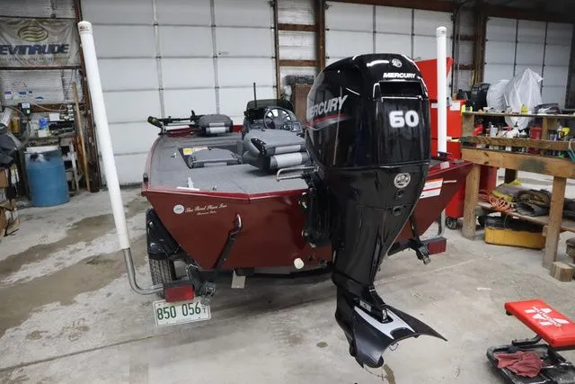 Slide: The Image of 2022 Lowe Skorpion 17 boat with Mercury 60 engine in garage. - 5