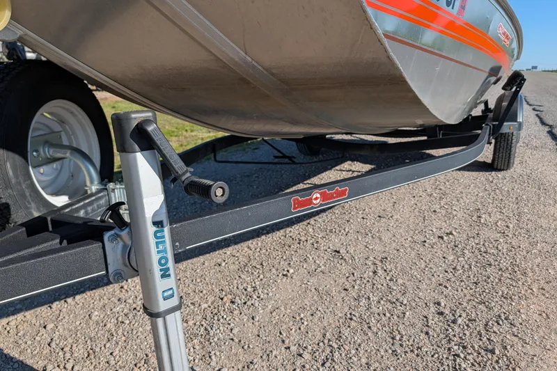 Slide: The Image of 2018 Tracker Bass Tracker 40th Anniversary Heritage Edition boat on trailer, featuring Fulton jack. - 10