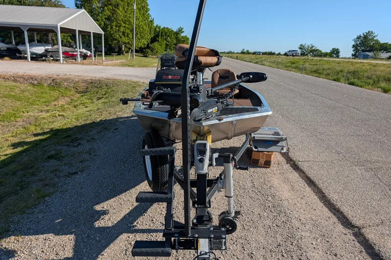 Slide: The Image of 2018 Tracker Bass Tracker 40th Anniversary Heritage Edition boat on trailer, parked on roadside. - 17