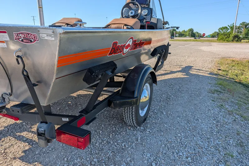 Slide: The Image of 2018 Tracker Bass Tracker 40th Anniversary Heritage Edition boat on a gravel road. - 6