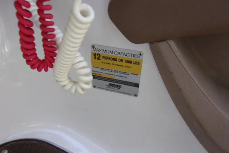 Slide: The Image of Capacity label on 2007 Cobalt 222 boat, indicating 12 persons or 1500 lbs limit. - 19