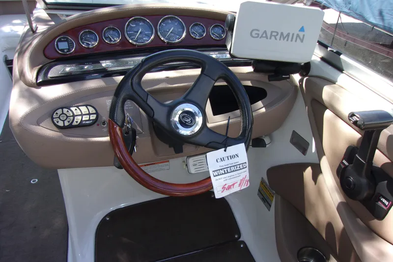 Slide: The Image of Steering console of a 2007 Cobalt 222 boat with Garmin GPS system. - 6
