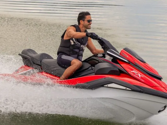 Slide: The Image of Man riding 2026 Yamaha WaveRunner FX Cruiser HO on water. - 5