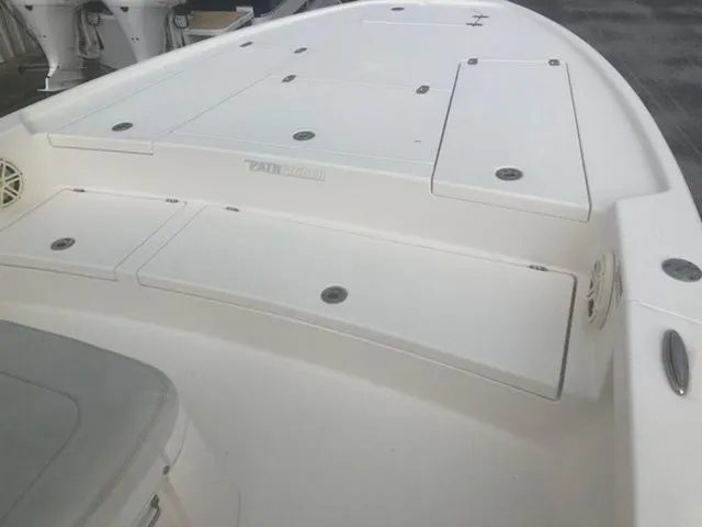 Slide: The Image of Pathfinder 2500 Hybrid 2020 boat deck with storage compartments. - 5