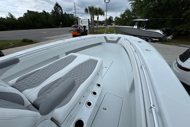 Slide: The Image of 2026 Invincible 33 Open Fisherman boat with sleek seating and modern design. - 17